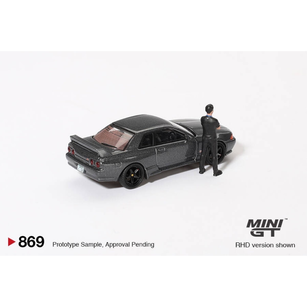 Mini Gt 1/64 Nissan Skyline Gt-R (R32)Gunmetal W/ Matsuda Figure